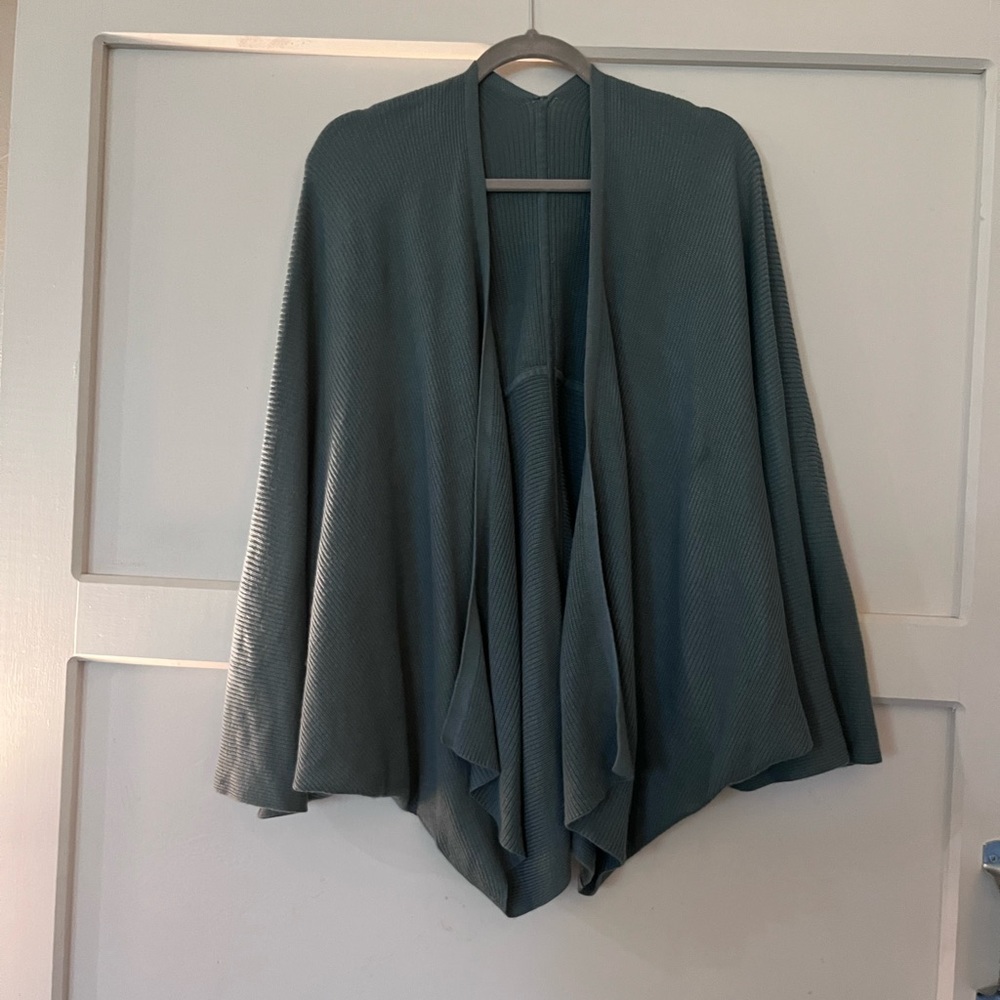 Lululemon sweater wrap.  O/s fits most. Teal. No tag.